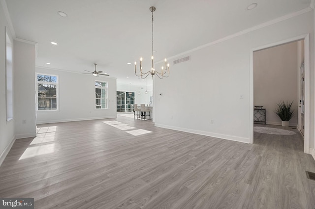 interior space with ceiling fan with notable chandelier, light hardwood / wood-style flooring, and ornamental molding