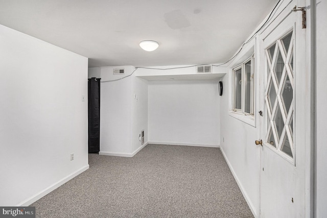 basement featuring carpet floors