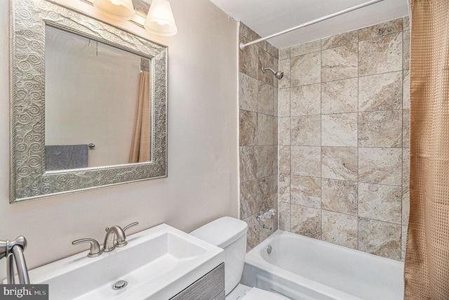 full bathroom featuring vanity, toilet, and shower / bath combo with shower curtain