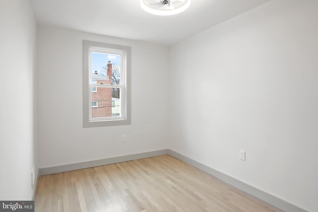 spare room with light hardwood / wood-style floors