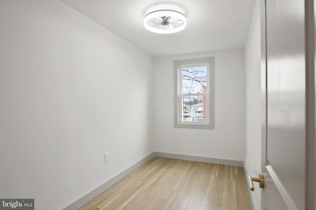 spare room featuring light hardwood / wood-style floors