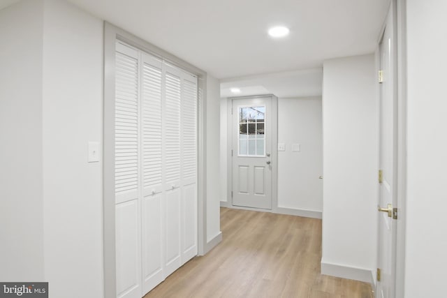 corridor featuring light wood-type flooring