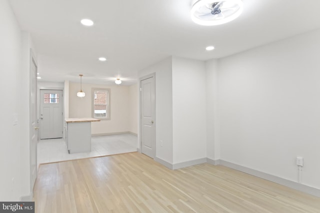 unfurnished room featuring light wood-type flooring