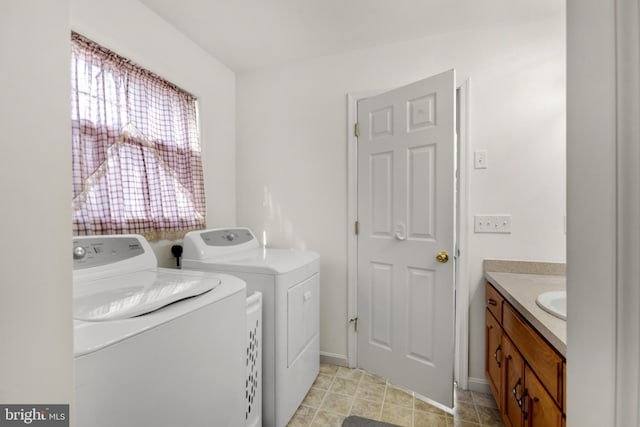 clothes washing area featuring washing machine and dryer