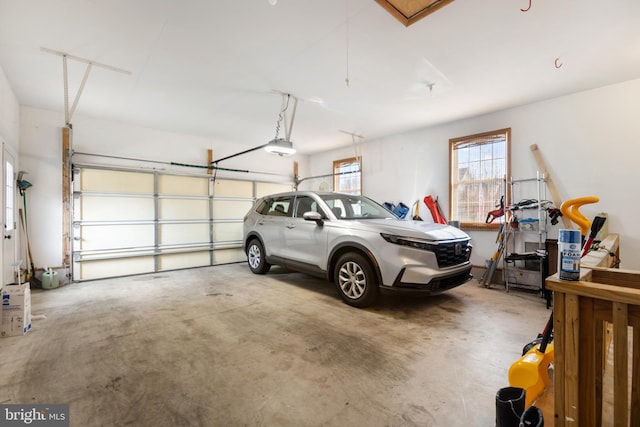 garage featuring a garage door opener