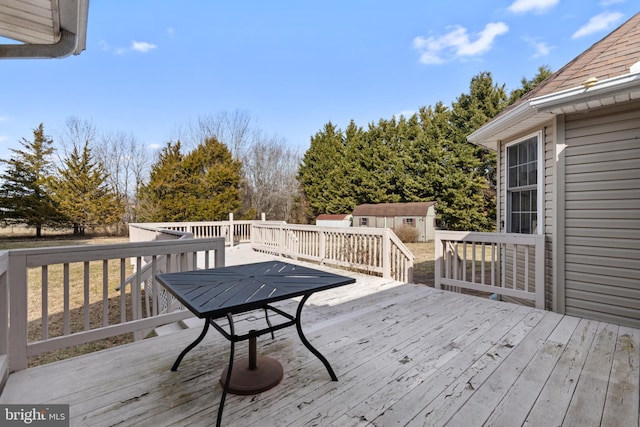 deck featuring a storage unit