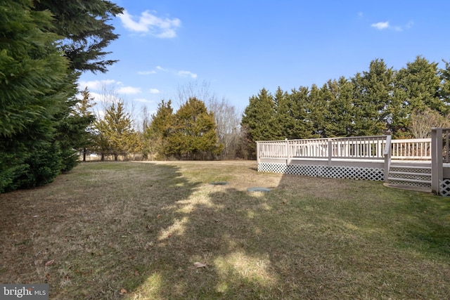 view of yard featuring a deck