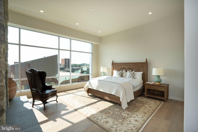 bedroom with light wood-type flooring