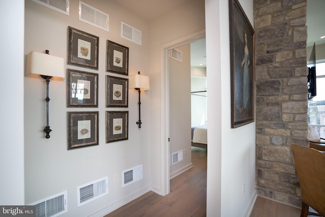 hall featuring hardwood / wood-style flooring