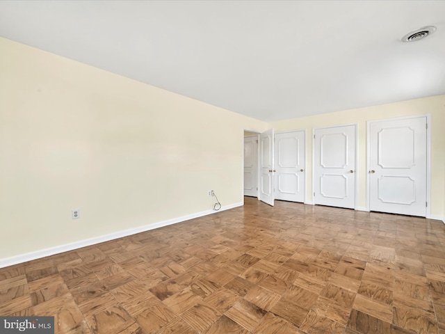 interior space with light parquet floors