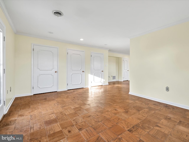 unfurnished room featuring crown molding and light parquet flooring