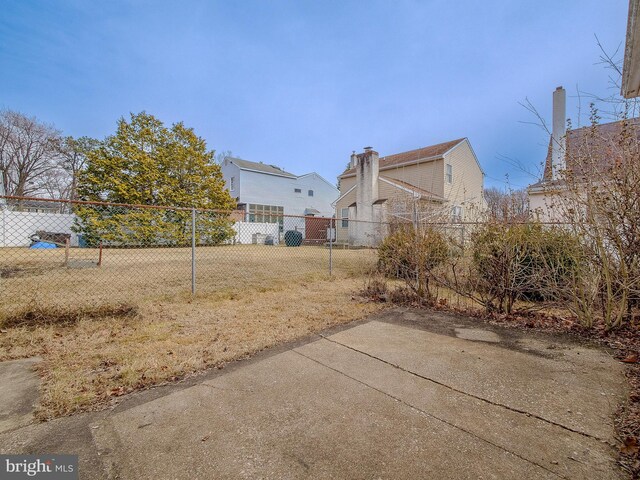 view of yard with a patio area and fence