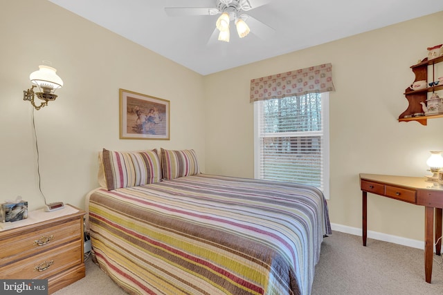 bedroom featuring light colored carpet