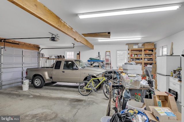 garage featuring a garage door opener