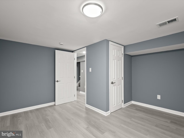 basement with light wood-type flooring