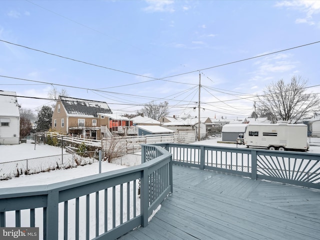 view of snow covered deck