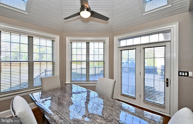 dining room featuring wood-type flooring and ceiling fan