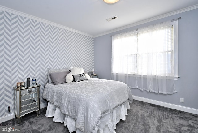 bedroom featuring dark carpet and ornamental molding