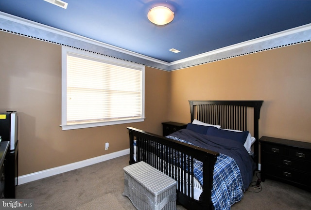 carpeted bedroom featuring ornamental molding