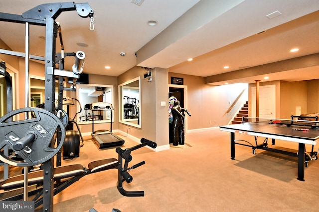 workout area with light carpet