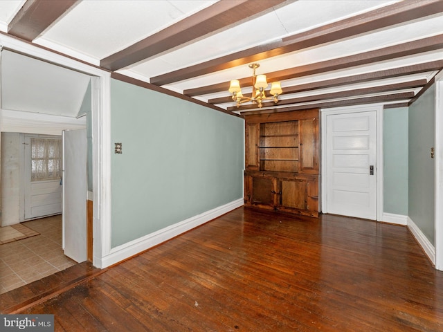 interior space featuring beam ceiling, dark hardwood / wood-style flooring, and a chandelier