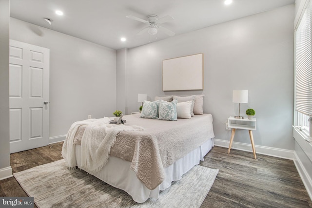 bedroom featuring dark wood-type flooring and ceiling fan