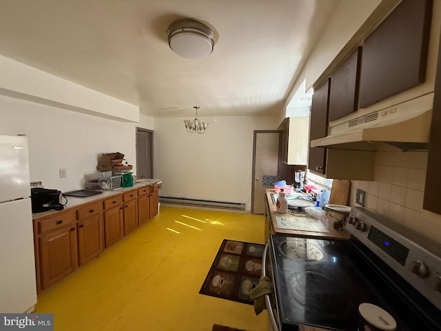 kitchen with electric range, brown cabinetry, freestanding refrigerator, baseboard heating, and light countertops