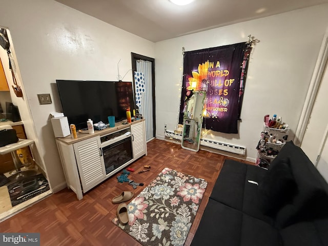 living room featuring a baseboard radiator and baseboards