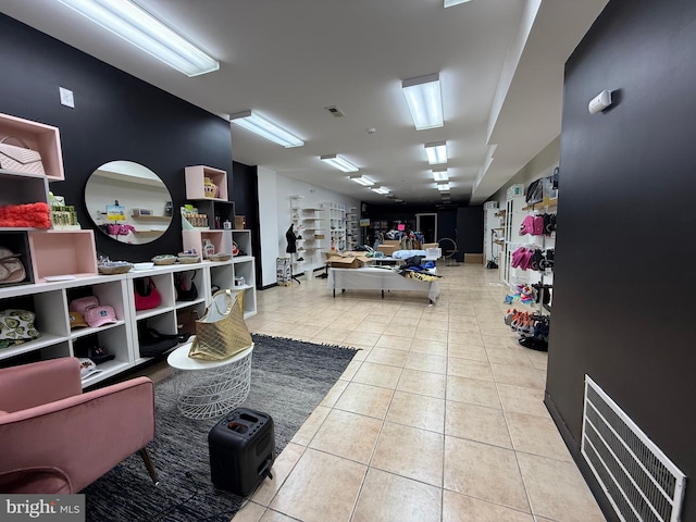 interior space featuring visible vents and light tile patterned floors