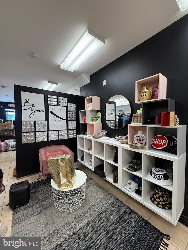 playroom featuring tile patterned flooring