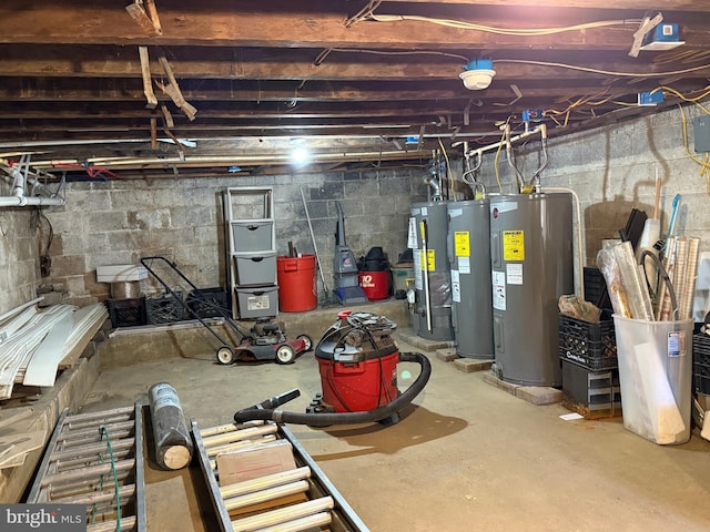 unfinished basement with water heater and electric water heater