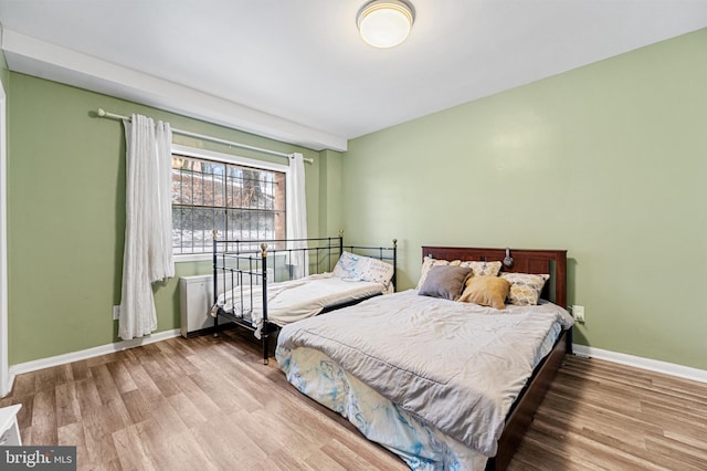 bedroom featuring light hardwood / wood-style flooring