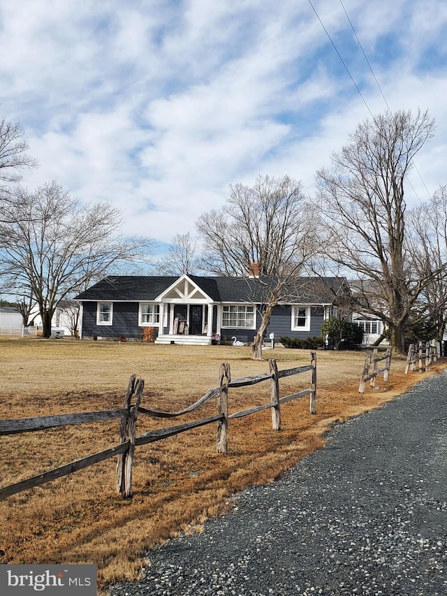 single story home with a front yard