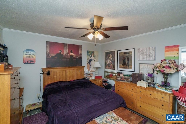 bedroom with ornamental molding and a textured ceiling