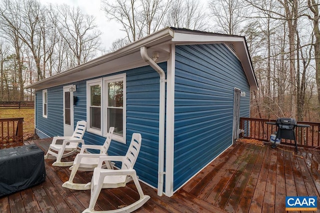 wooden terrace with grilling area