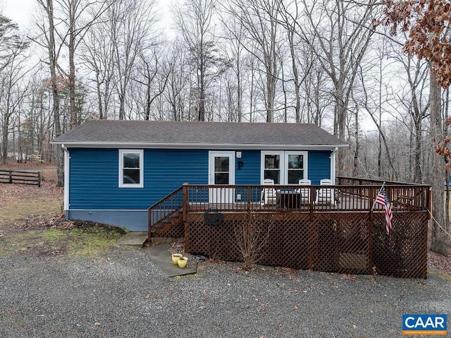 view of front of property with a wooden deck