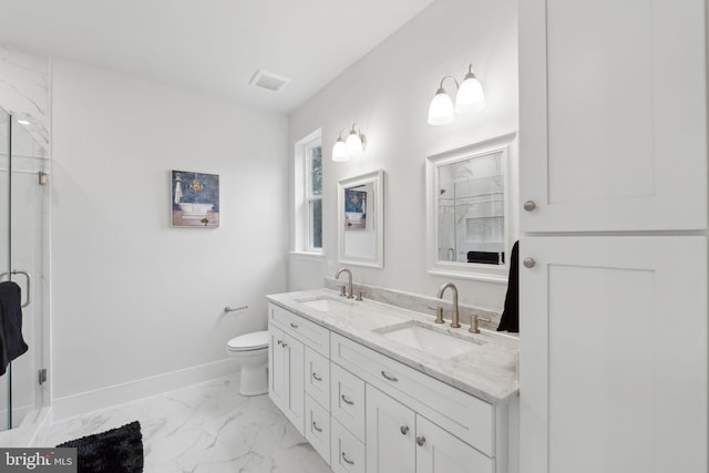 bathroom featuring vanity, toilet, and walk in shower