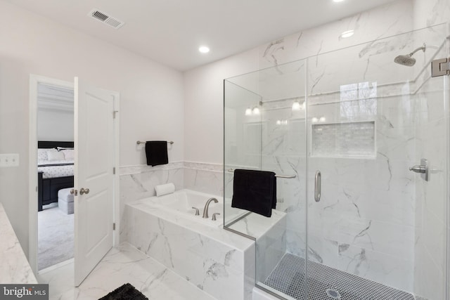 bathroom featuring plus walk in shower