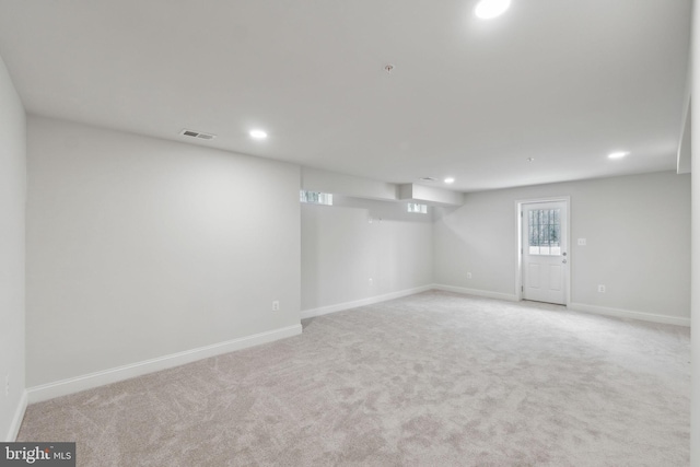 basement with light carpet