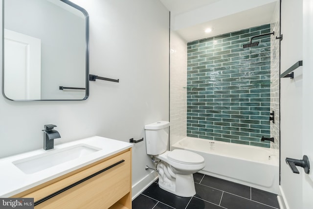 full bathroom featuring tile patterned flooring, toilet, vanity, baseboards, and shower / washtub combination