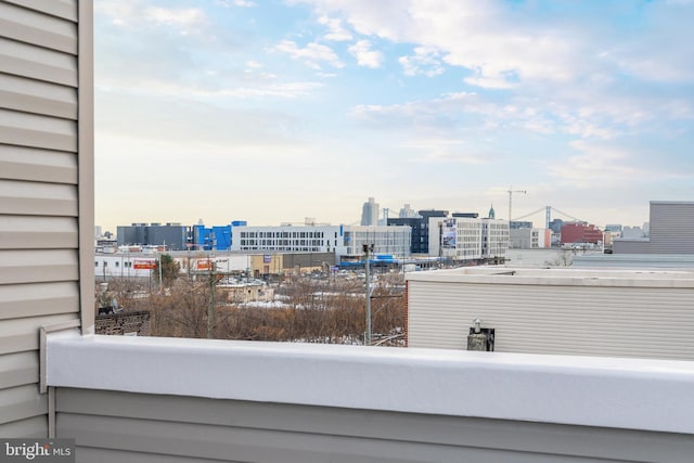 balcony featuring a city view