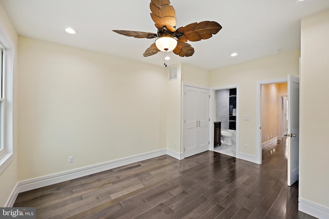 718 Collington Ave, Baltimore, MD 21205 - unfurnished bedroom featuring dark wood-type flooring, ensuite bath, and ceiling fan