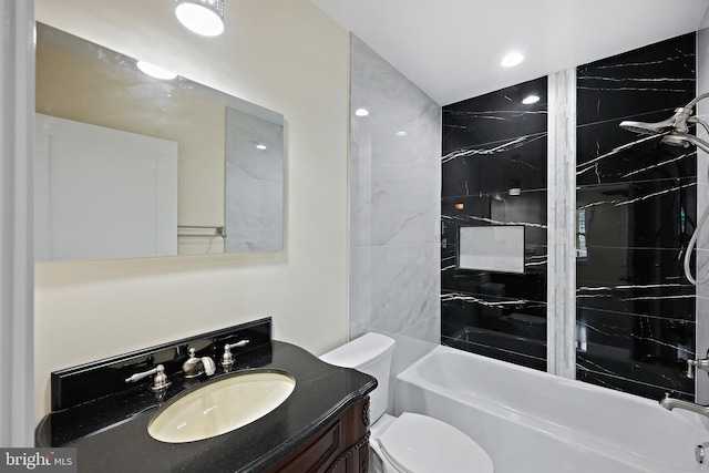 718 Collington Ave, Baltimore, MD 21205 - full bathroom featuring vanity, tiled shower / bath, and toilet