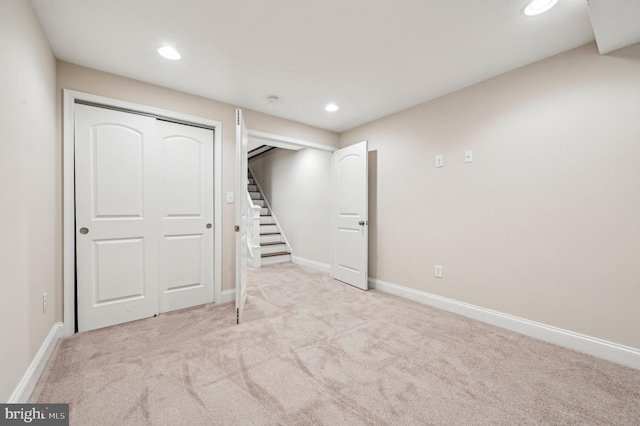 basement with light carpet