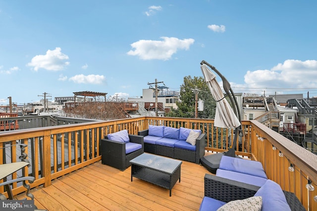 wooden terrace featuring an outdoor living space