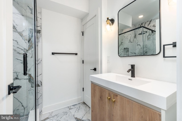 bathroom with vanity and an enclosed shower