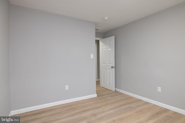 empty room with light wood-type flooring