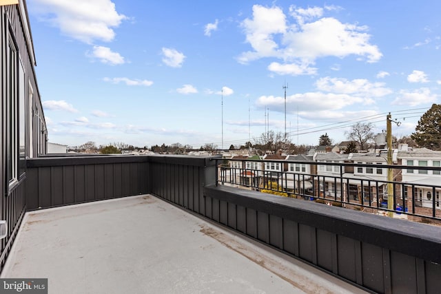 view of patio / terrace with a residential view and a balcony