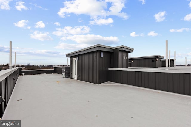 view of side of home featuring a patio area