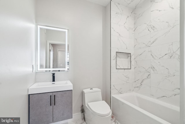 bathroom with shower / bath combination, toilet, marble finish floor, and vanity